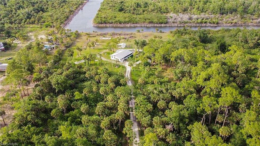7.7 Acres of Residential Land with Home for Sale in Naples, Florida
