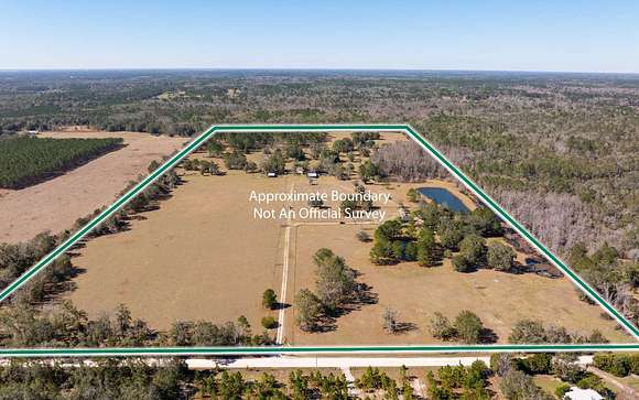 79 Acres of Agricultural Land with Home for Sale in Wellborn, Florida