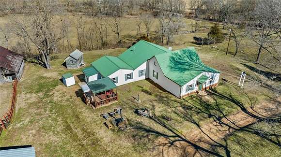 68.4 Acres of Agricultural Land with Home for Sale in Rogers, Arkansas