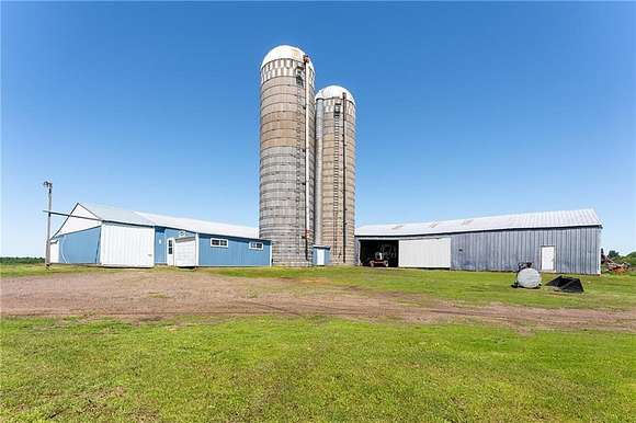 100 Acres of Agricultural Land with Home for Sale in Stanley, Wisconsin