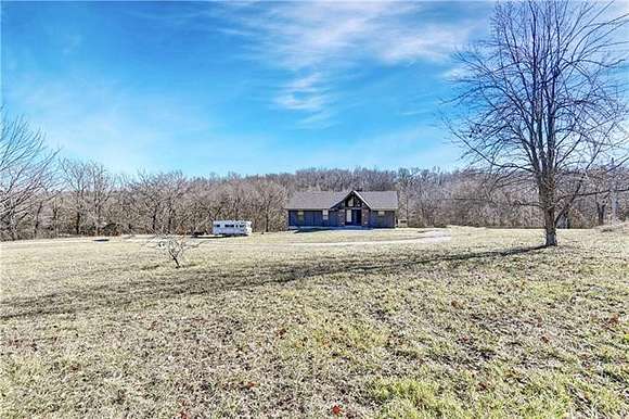 4.6 Acres of Residential Land with Home for Sale in Lone Jack, Missouri
