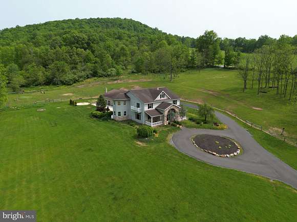 144 Acres of Land with Home for Sale in Julian, Pennsylvania