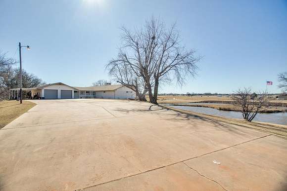 6 Acres of Residential Land with Home for Sale in Enid, Oklahoma