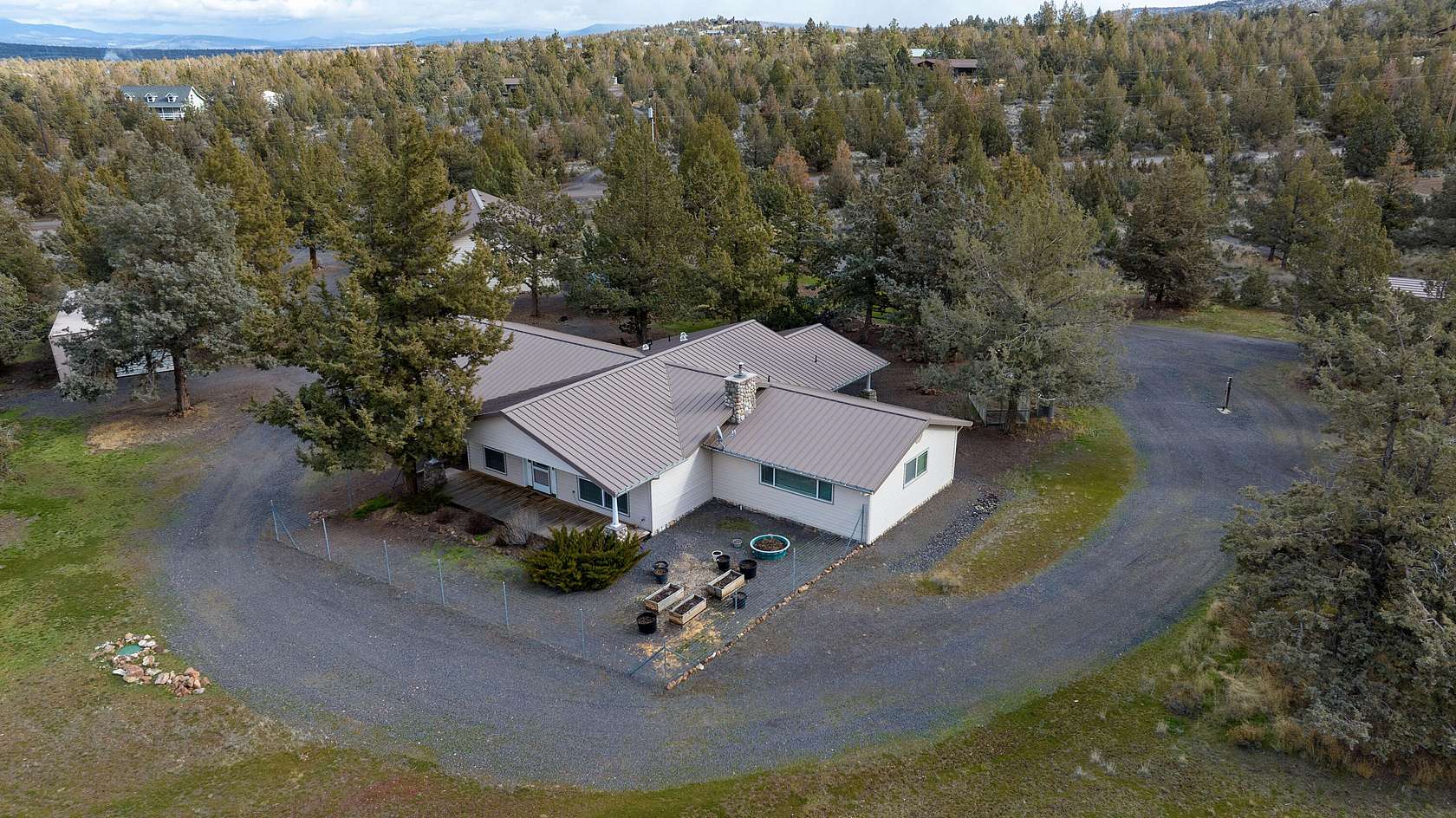 4.9 Acres of Residential Land with Home for Sale in Powell Butte, Oregon