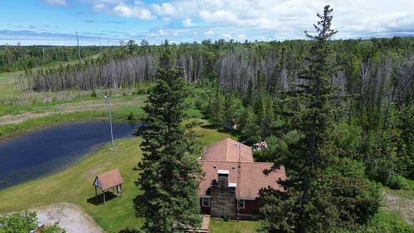 116 Acres of Recreational Land with Home for Sale in Posen, Michigan