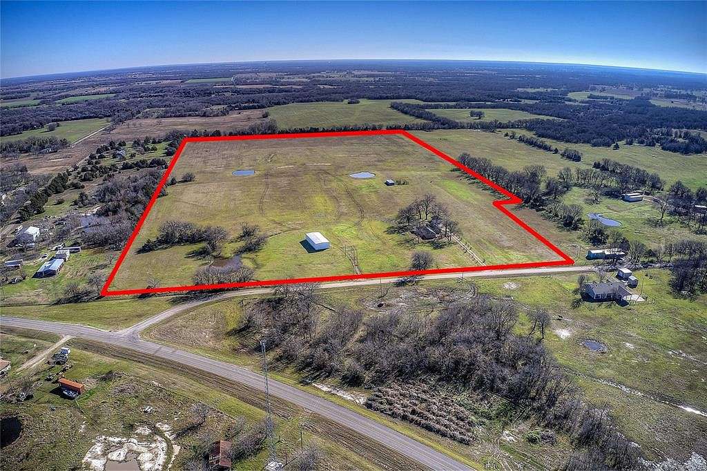 46.6 Acres of Agricultural Land with Home for Sale in Commerce, Texas