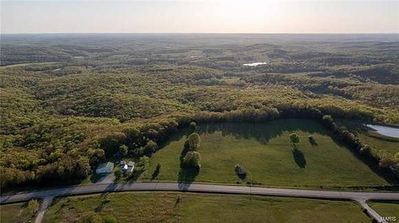 70.2 Acres of Land with Home for Sale in Vichy, Missouri