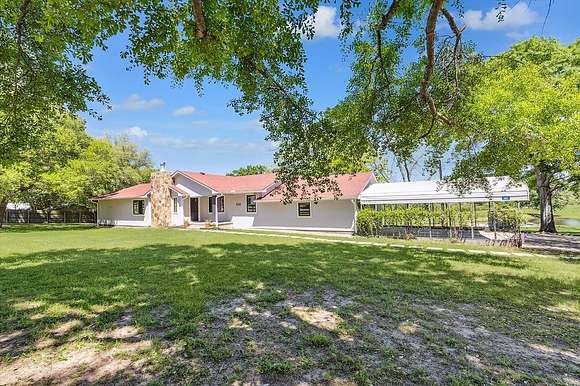 6.4 Acres of Land with Home for Sale in Kenney, Texas
