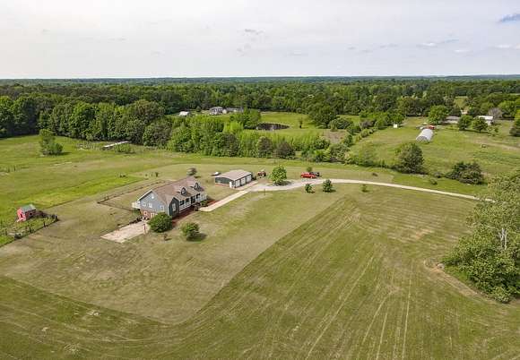 61 Acres of Land with Home for Sale in Doniphan, Missouri