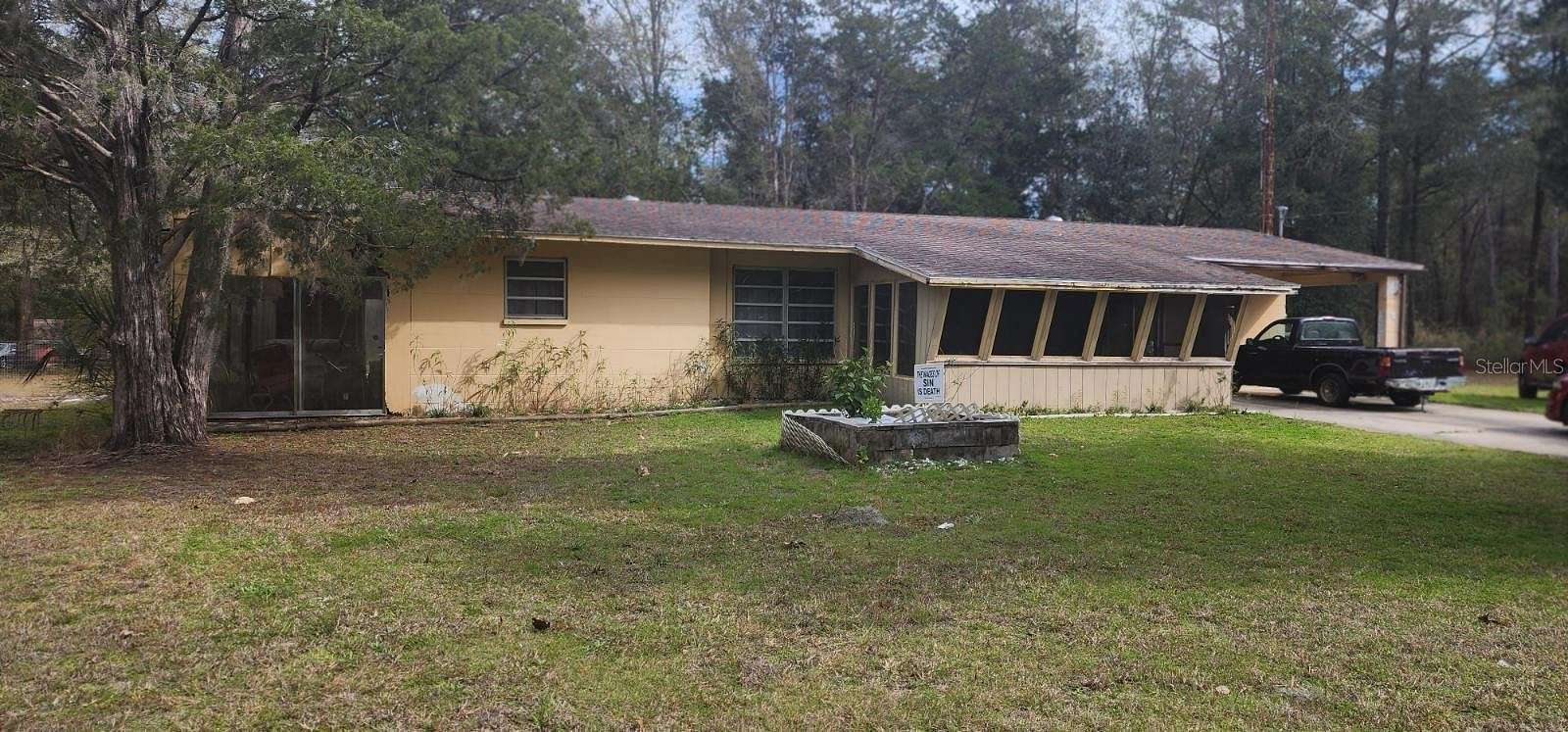 2.4 Acres of Residential Land with Home for Sale in Dunnellon, Florida