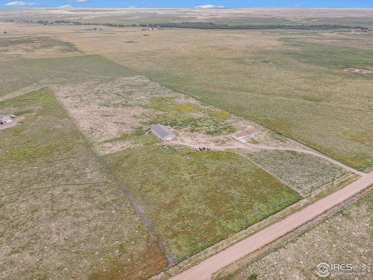21 Acres of Land with Home for Sale in Briggsdale, Colorado