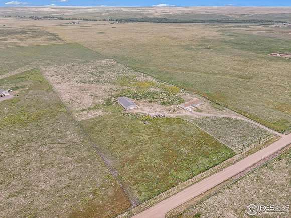 21.01 Acres of Land with Home for Sale in Briggsdale, Colorado