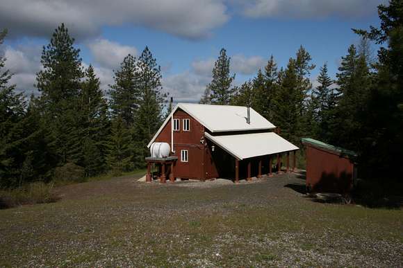 10 Acres of Recreational Land with Home for Sale in Elk, Washington