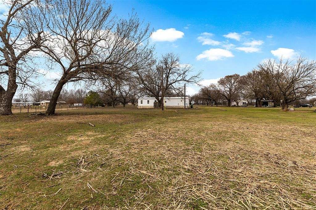 3.2 Acres of Residential Land with Home for Sale in Grandview, Texas