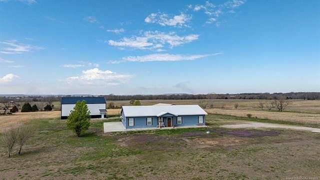 14.3 Acres of Land with Home for Sale in Dewey, Oklahoma