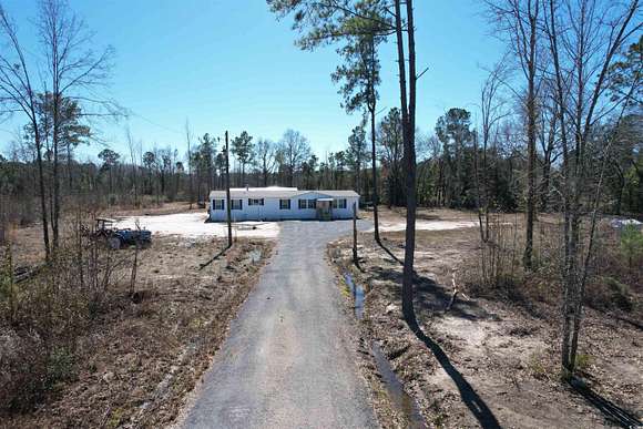 5.8 Acres of Residential Land with Home for Sale in Greeleyville, South Carolina