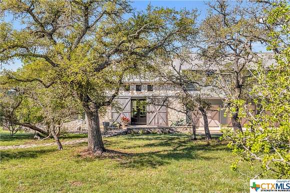 12.45 Acres of Land with Home for Sale in Fredericksburg, Texas