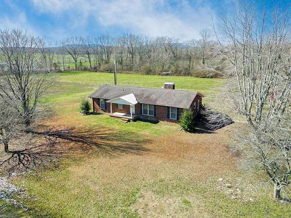 31.8 Acres of Agricultural Land with Home for Sale in Smithville, Tennessee