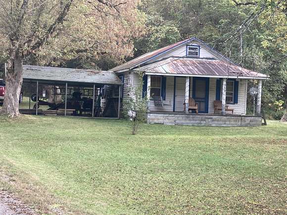 25.7 Acres of Land with Home for Auction in Eidson, Tennessee