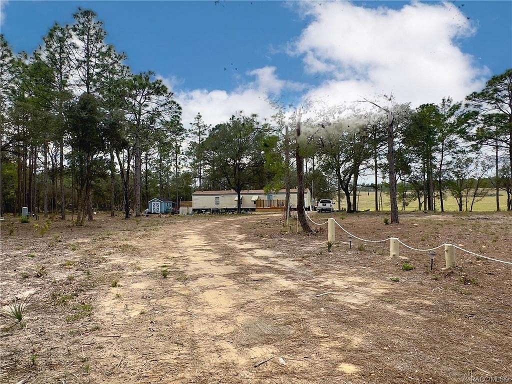 4.5 Acres of Residential Land with Home for Sale in Dunnellon, Florida
