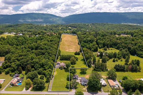 6.7 Acres of Residential Land with Home for Sale in Dunlap, Tennessee