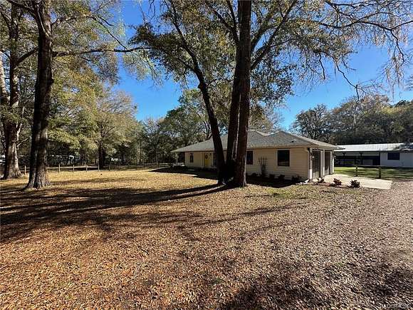 4.9 Acres of Residential Land with Home for Sale in Inverness, Florida