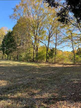 8.9 Acres of Residential Land with Home for Sale in Big Sandy, Tennessee