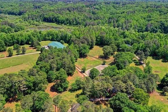 65 Acres of Agricultural Land with Home for Sale in Alpharetta, Georgia