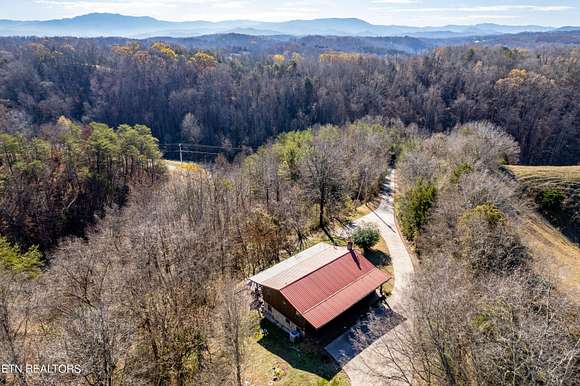 4.6 Acres of Residential Land with Home for Sale in Sevierville, Tennessee