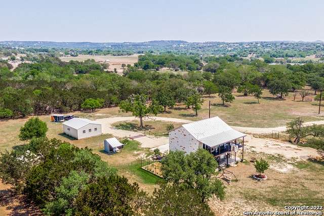 23.7 Acres of Agricultural Land with Home for Sale in Center Point, Texas