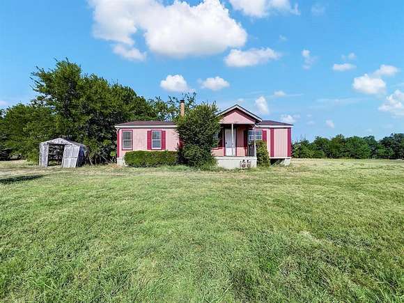 3.5 Acres of Residential Land with Home for Sale in Quinlan, Texas
