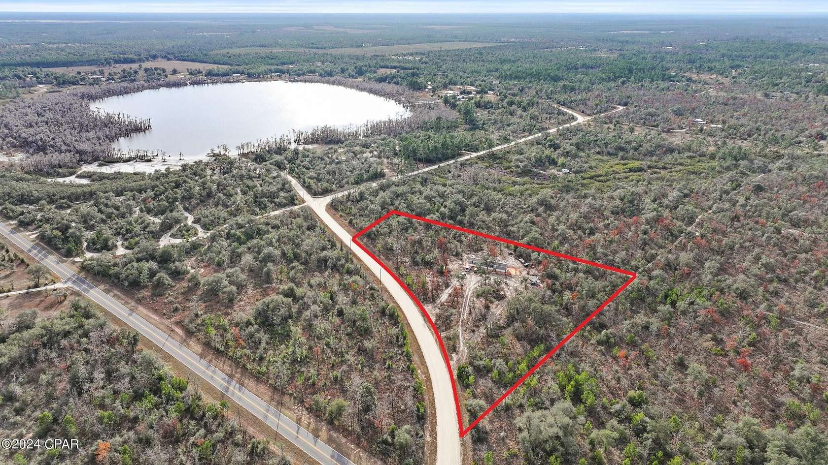 5.2 Acres of Residential Land with Home for Sale in Altha, Florida
