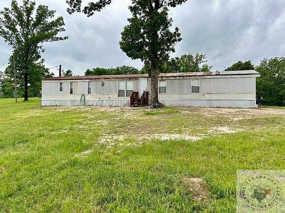 2 Acres of Residential Land with Home for Sale in Queen City, Texas