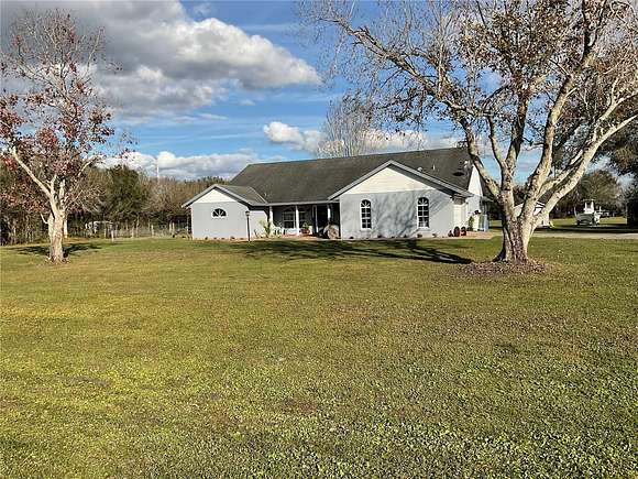 2.6 Acres of Residential Land with Home for Sale in Okeechobee, Florida