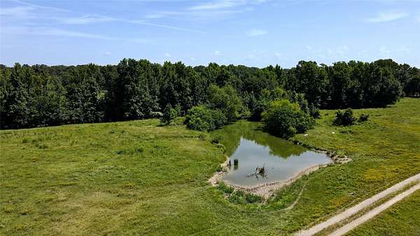 48.6 Acres of Recreational Land with Home for Sale in Murchison, Texas