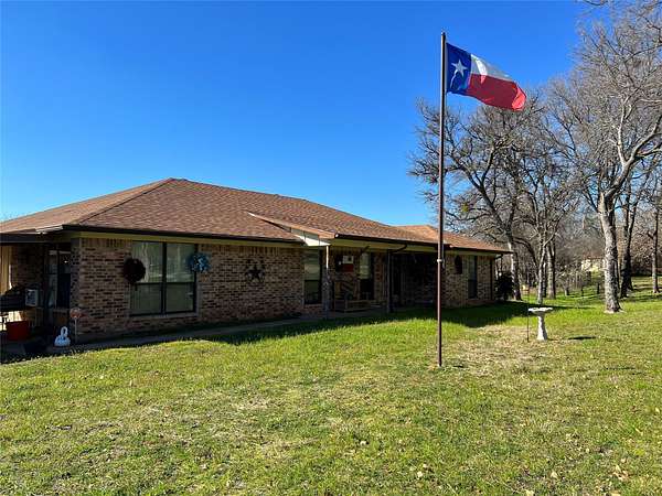 2.59 Acres of Land with Home for Sale in Granbury, Texas