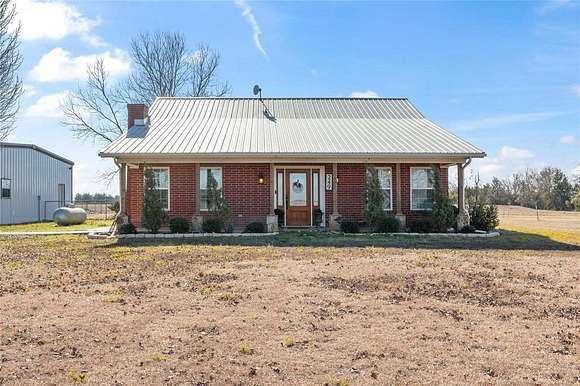 12.1 Acres of Land with Home for Sale in Roxton, Texas