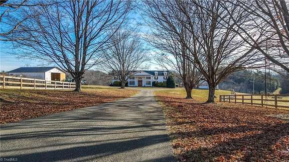 11.7 Acres of Land with Home for Sale in East Bend, North Carolina