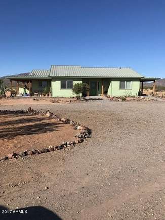 7.4 Acres of Residential Land with Home for Sale in Aguila, Arizona