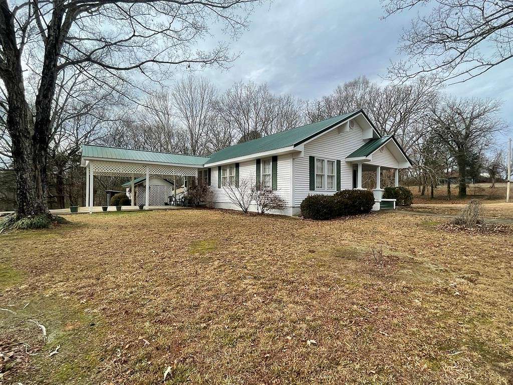 2.4 Acres of Residential Land with Home for Sale in Big Sandy, Tennessee