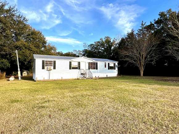 9.2 Acres of Residential Land with Home for Sale in Crawfordville, Florida