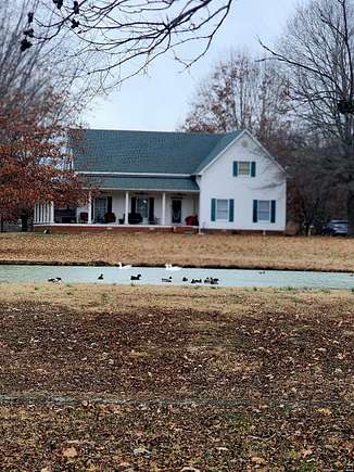 9.2 Acres of Land with Home for Sale in Martin, Tennessee