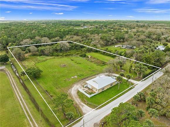 5 Acres of Residential Land with Home for Sale in Palm City, Florida