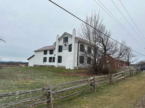 14.1 Acres of Land with Home for Sale in Peru, New York