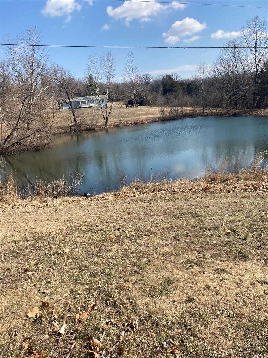 5.1 Acres of Residential Land with Home for Sale in Dixon, Missouri