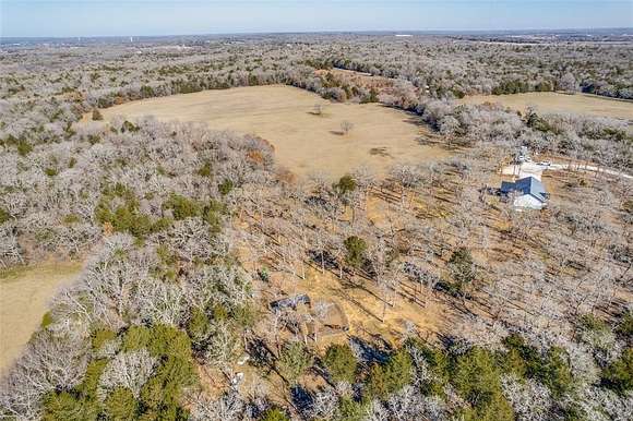 17.2 Acres of Land with Home for Sale in Collinsville, Texas