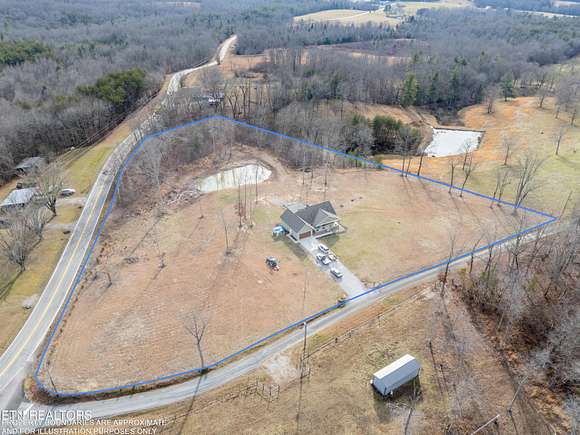 5.59 Acres of Land with Home for Sale in Deer Lodge, Tennessee
