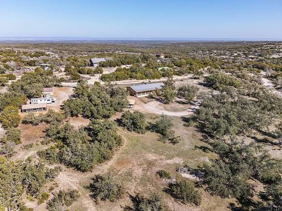 5.3 Acres of Residential Land with Home for Sale in Round Mountain, Texas