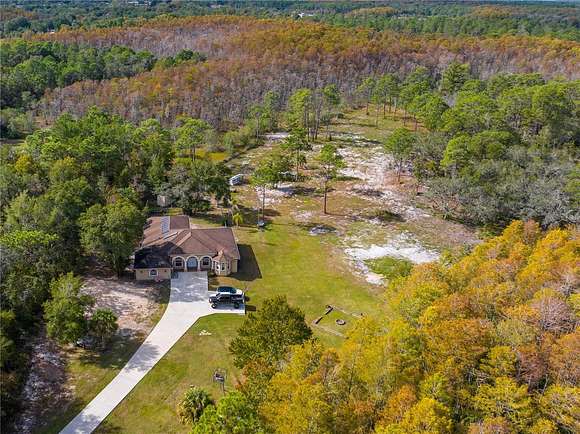 4.8 Acres of Residential Land with Home for Sale in Hudson, Florida
