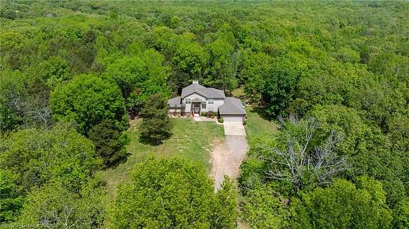 10.09 Acres of Recreational Land with Home for Sale in Mountainburg, Arkansas